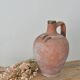 Ancient jug, terracotta pitcher from the Mediterranean.