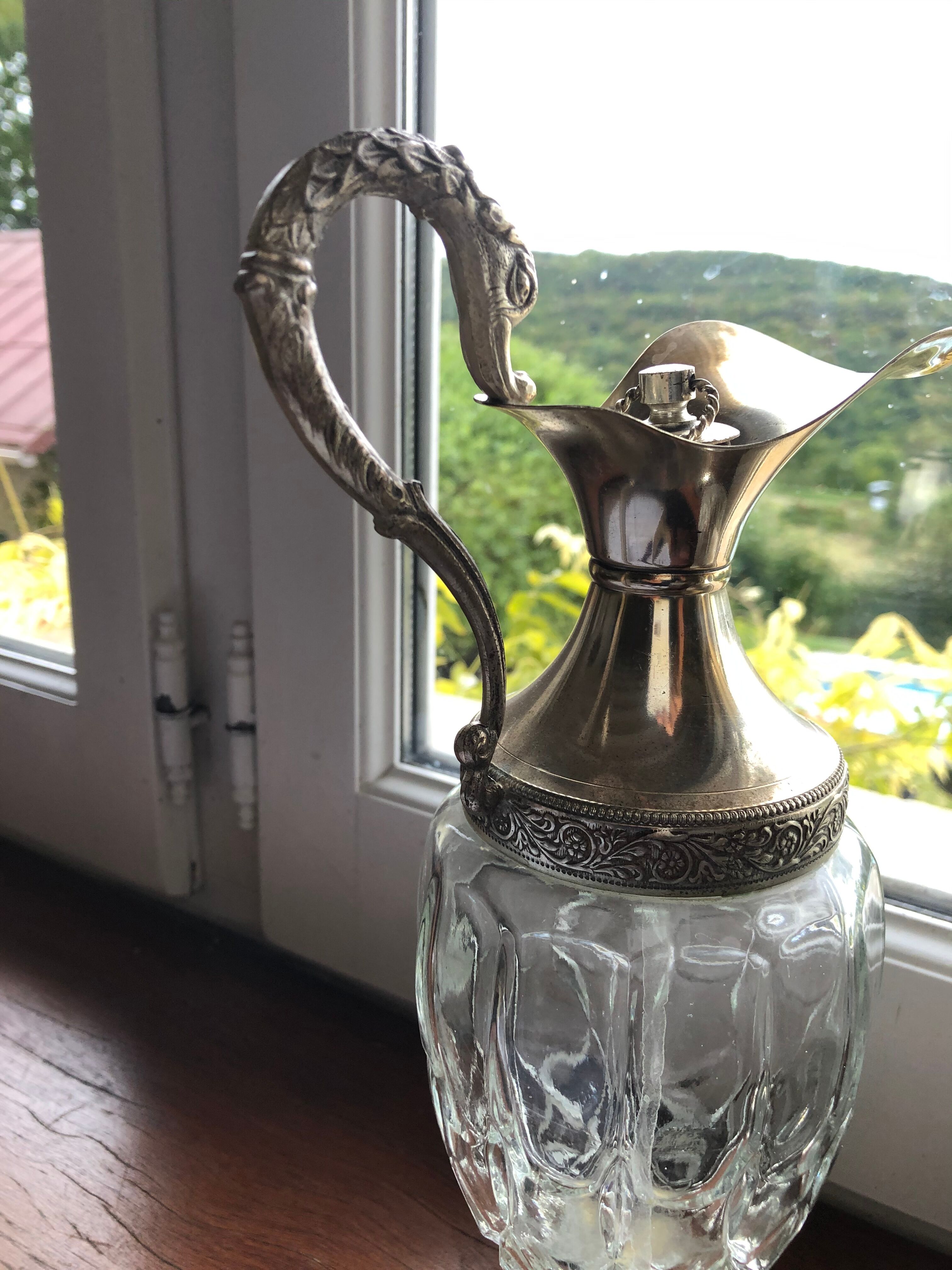 Pair of glass and silver metal ewers