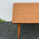 Wooden coffee table with compass leg