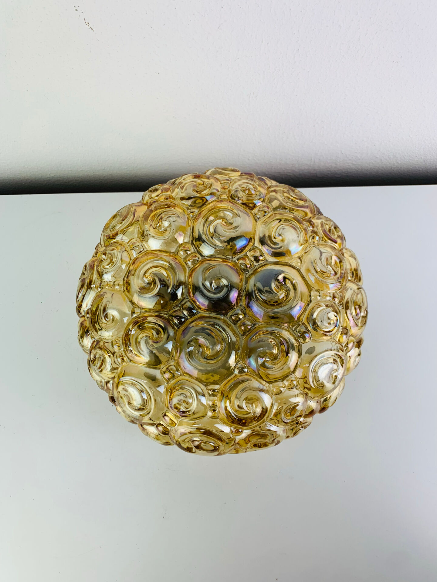 Amber glass Bubble wall light in the style of Helena Tynell, snail model. 60s.