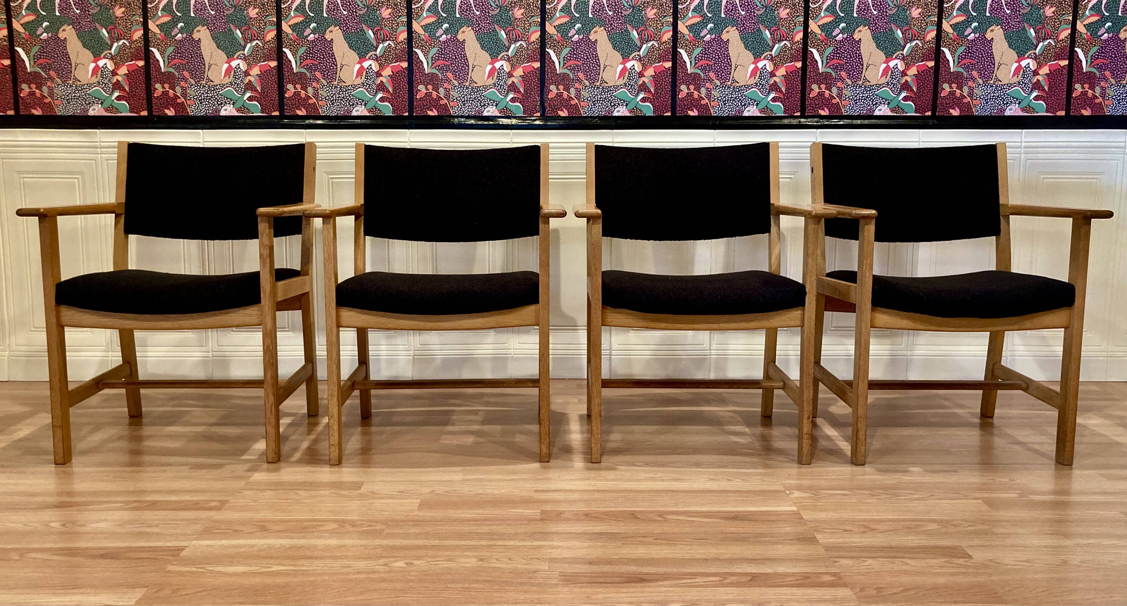 Set of 4 armchairs stamped Hans Wegner "Scandinavian design" 1960.