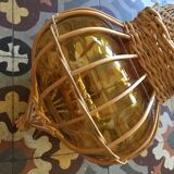 Suspension in wicker and amber glass