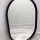 Brown plastic oval mirror, 1960s/1970s