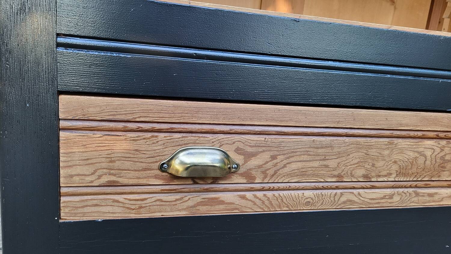 Two-tone black and honey bookcase