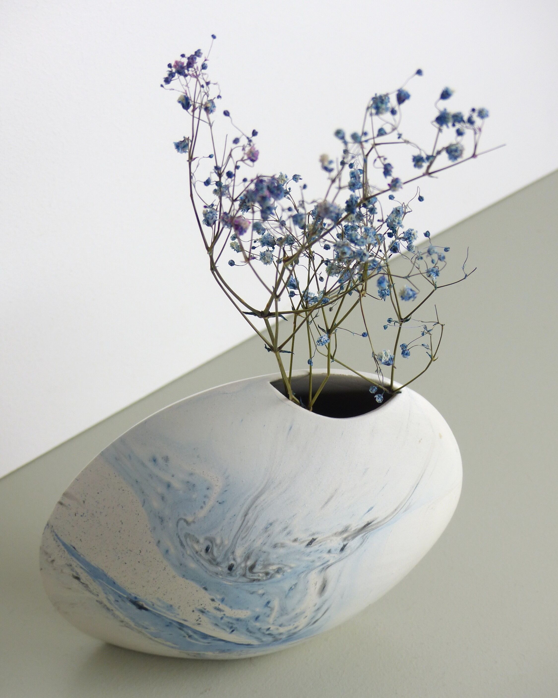 White and blue oval vase