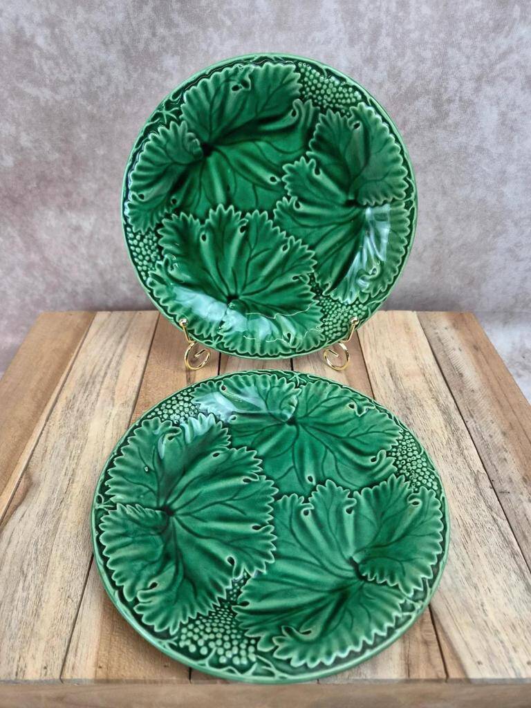 Set of 2 green earthenware dessert plates with vine decoration.