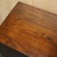 Large vintage hardwood furniture in military country style.