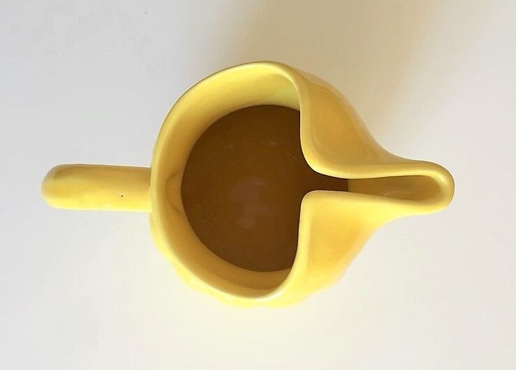 Old pitcher St Clement yellow