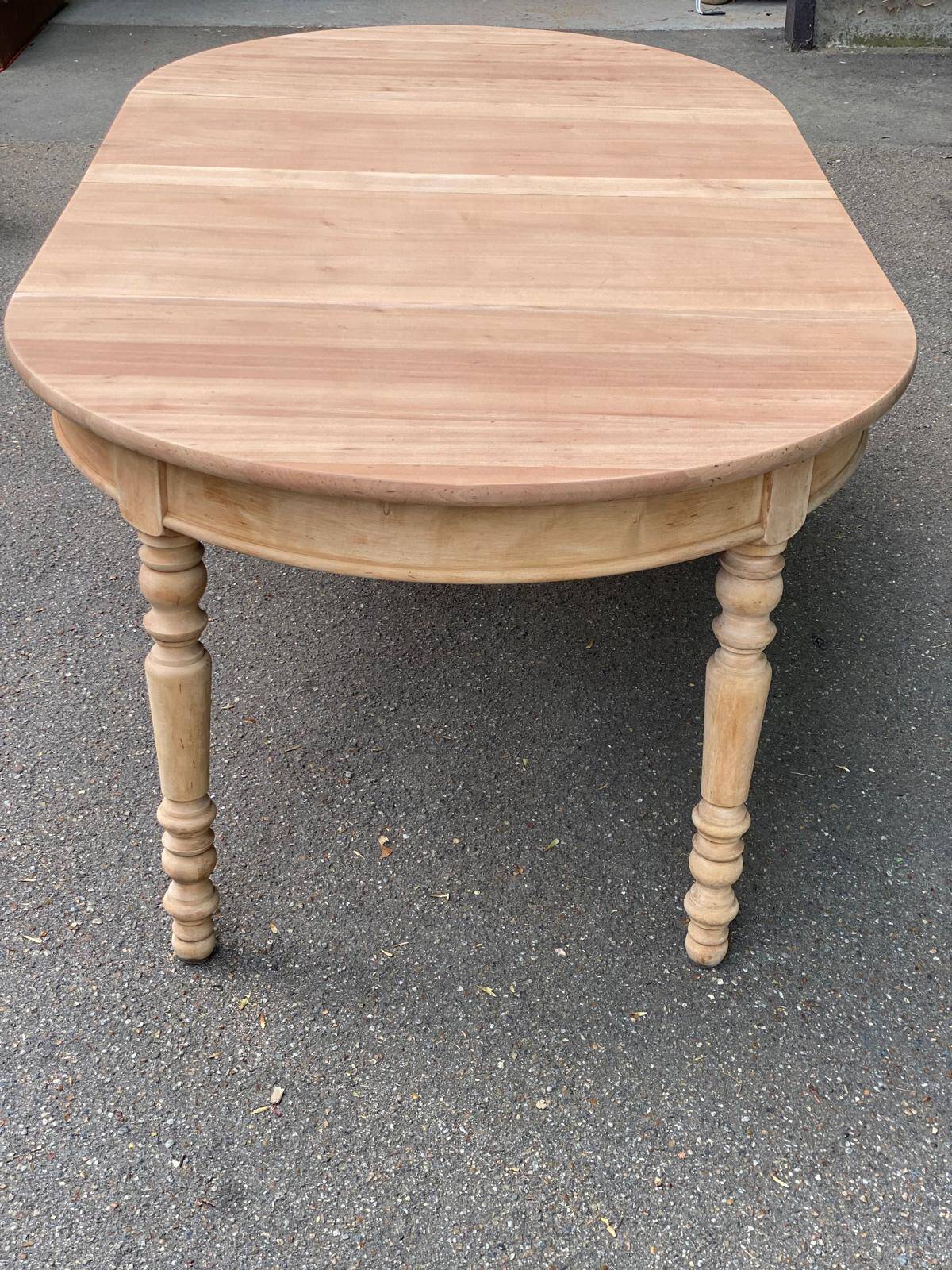 Round extendable dining table stripped in solid cherry wood France 1950