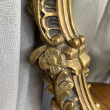 Rococo style mirror in wood and gilded stucco