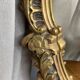 Rococo style mirror in wood and gilded stucco