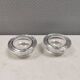 A set of iittala candle holders in clear transparent glass.