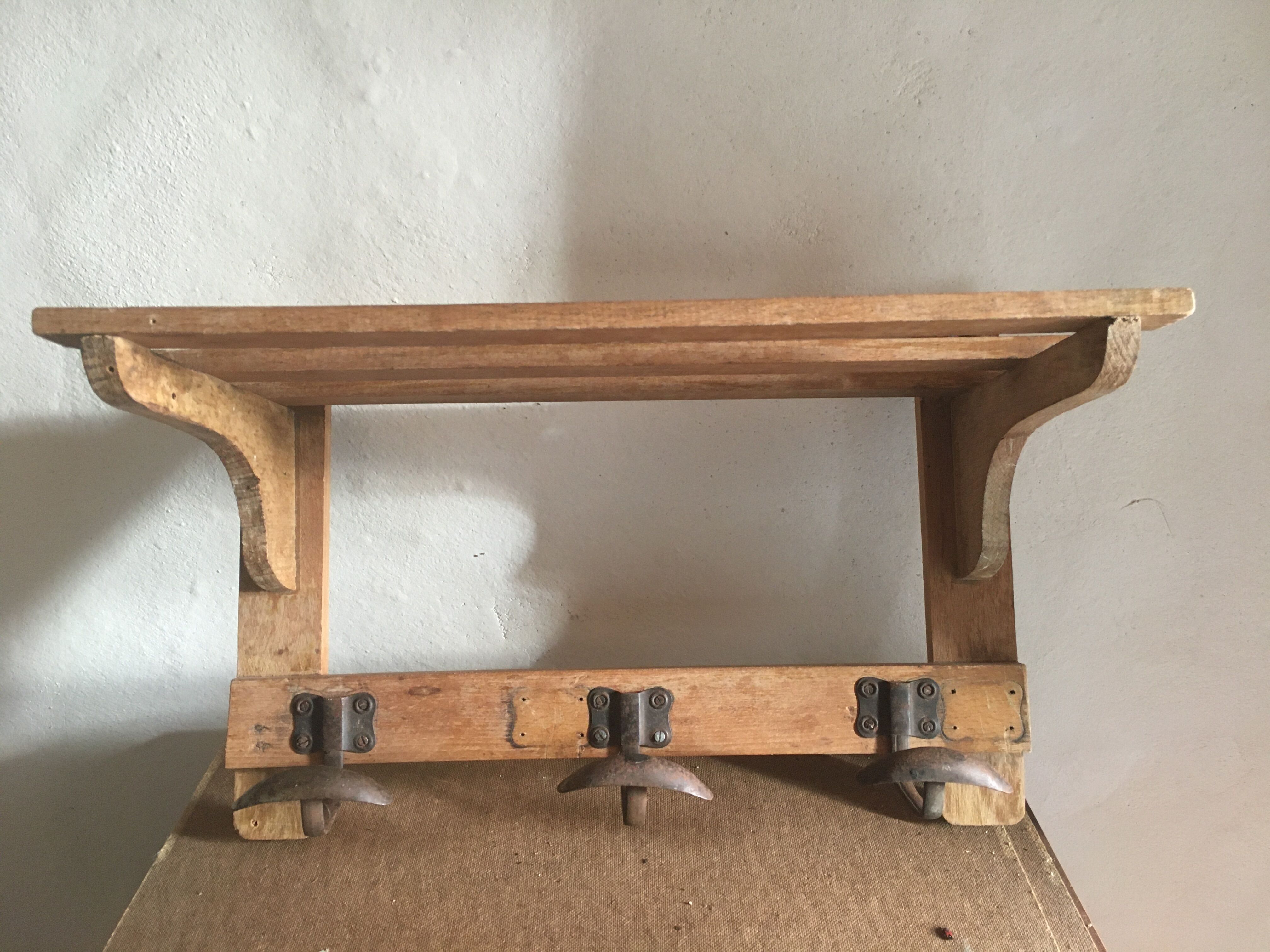 Wood shelf and metal hooks