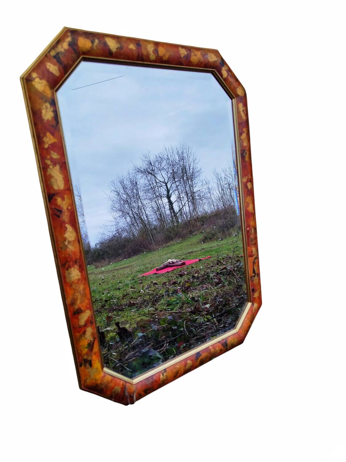 Bevelled octagonal mirror from the 1980s.