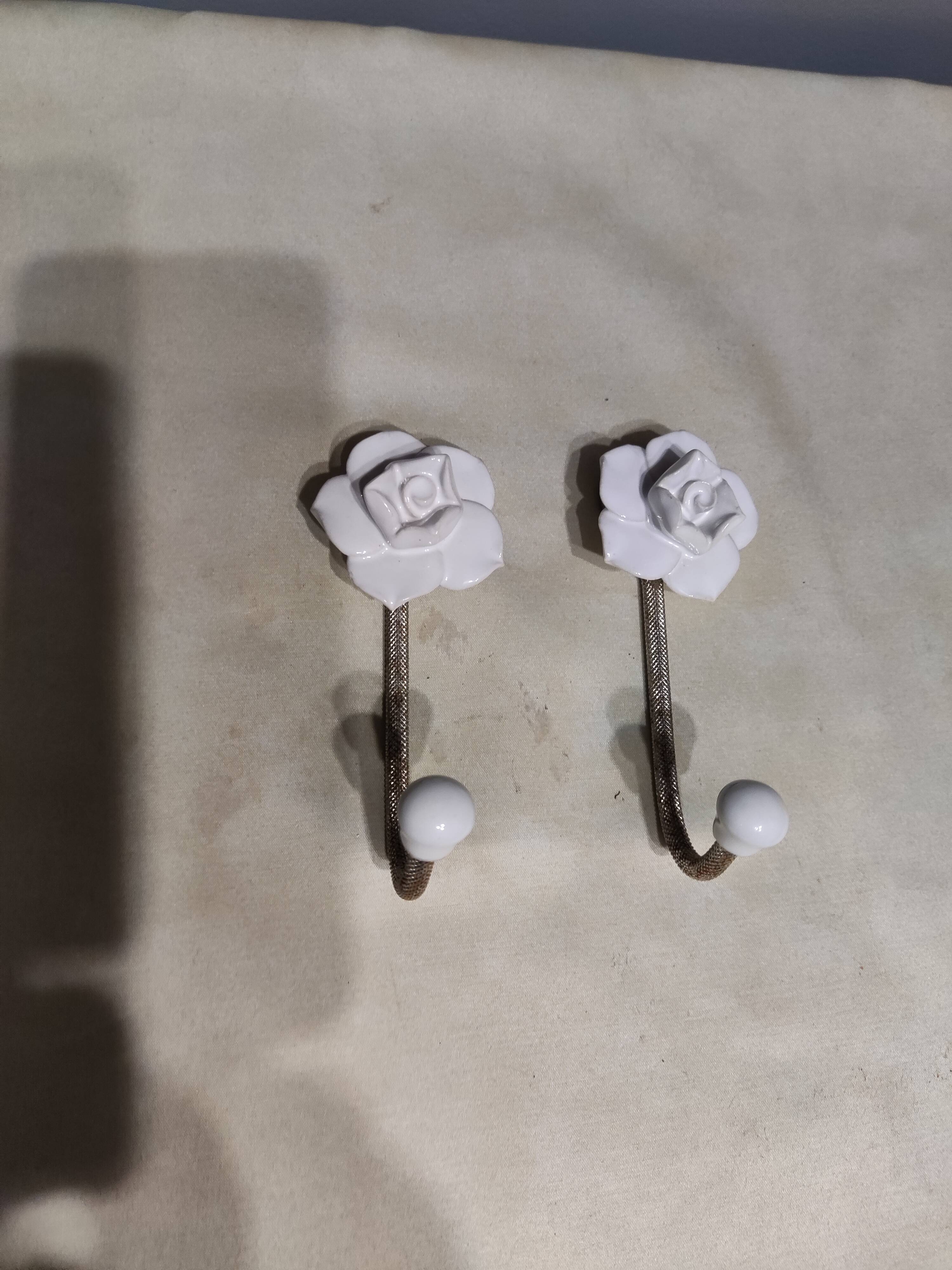 Pair of porcelain hooks