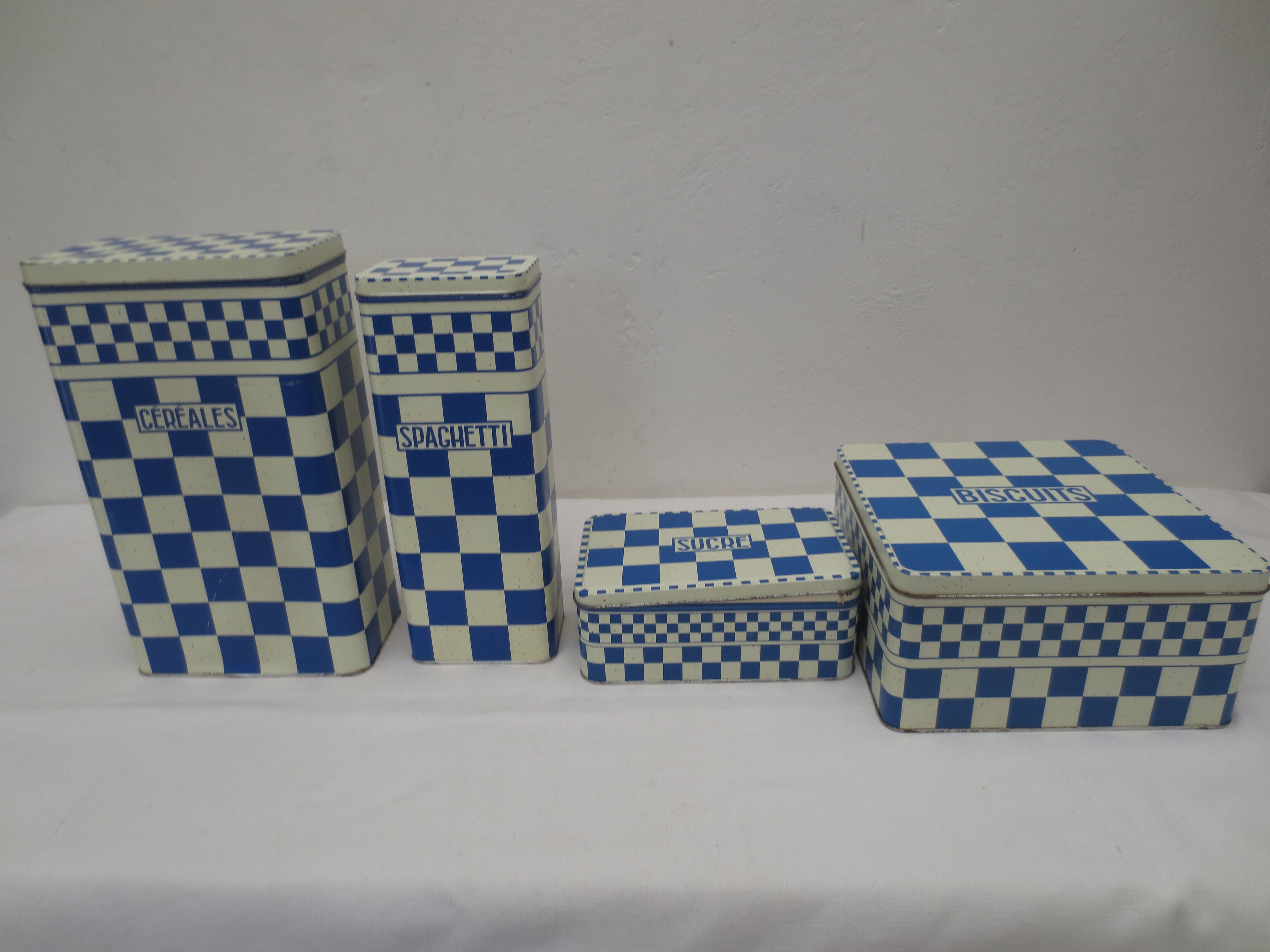 Series of 4 metal boxes, blue and white lustucru decoration