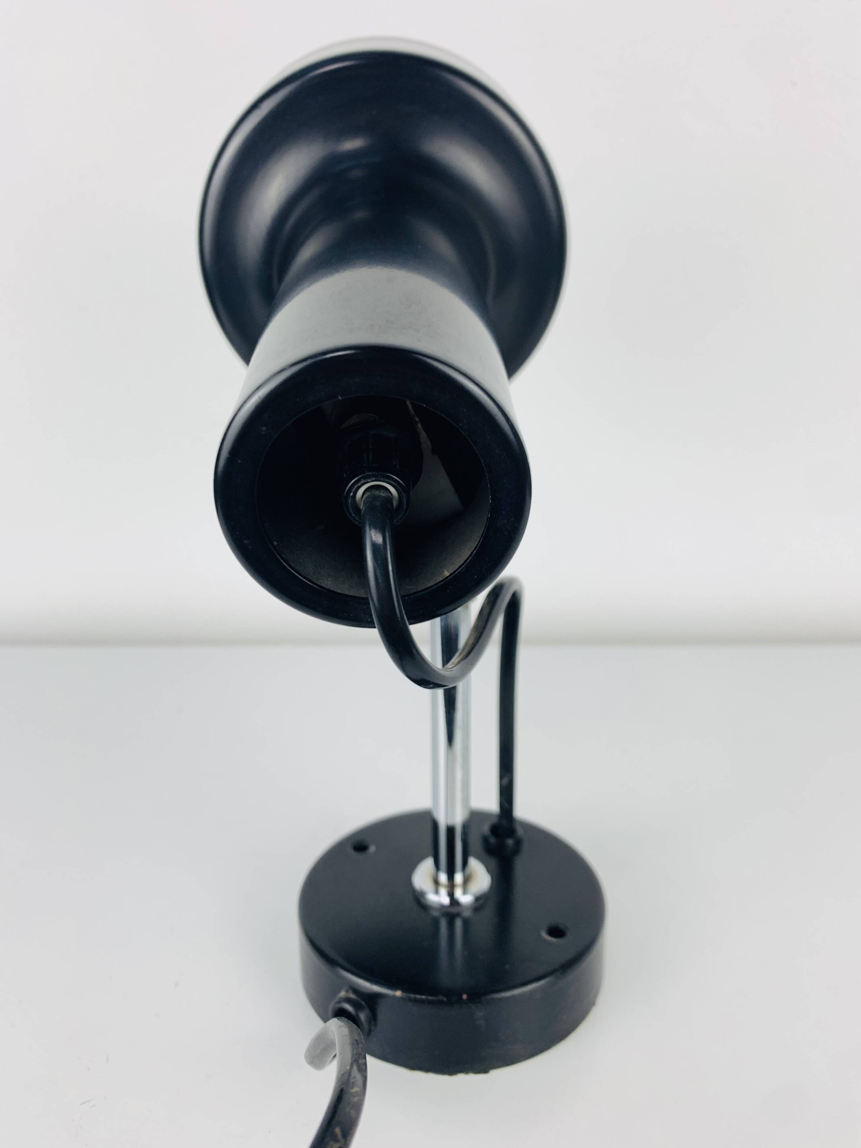 Black spot wall light from the 1960s, vintage.