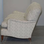 Howard & Sons canapé with feather cushions and ticking fabric, Victorian style.