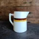 Vintage French ceramic pitcher with brown and ochre stripes