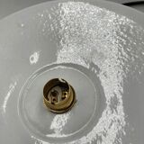 Suspensions in enamelled sheets