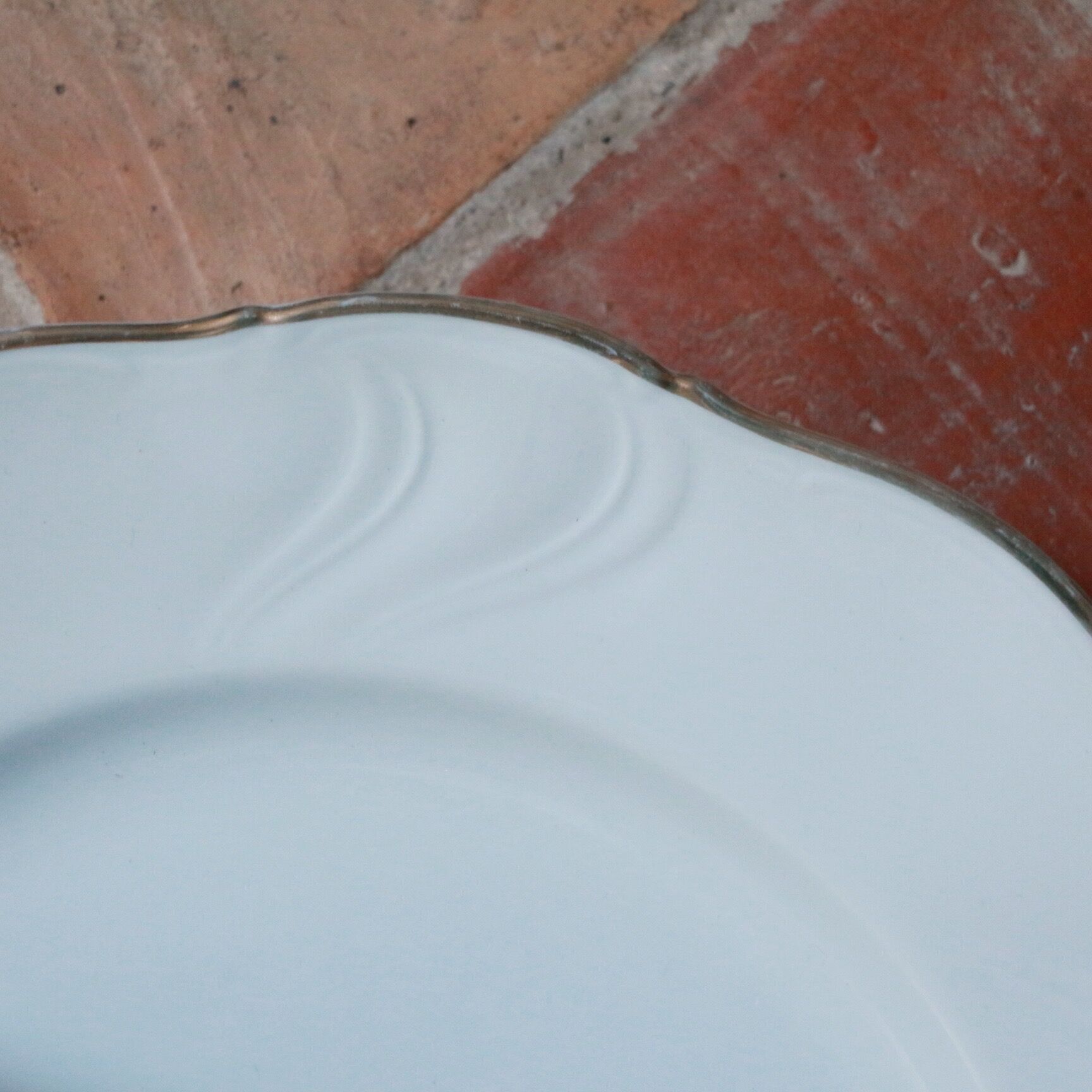White and gold porcelain plates