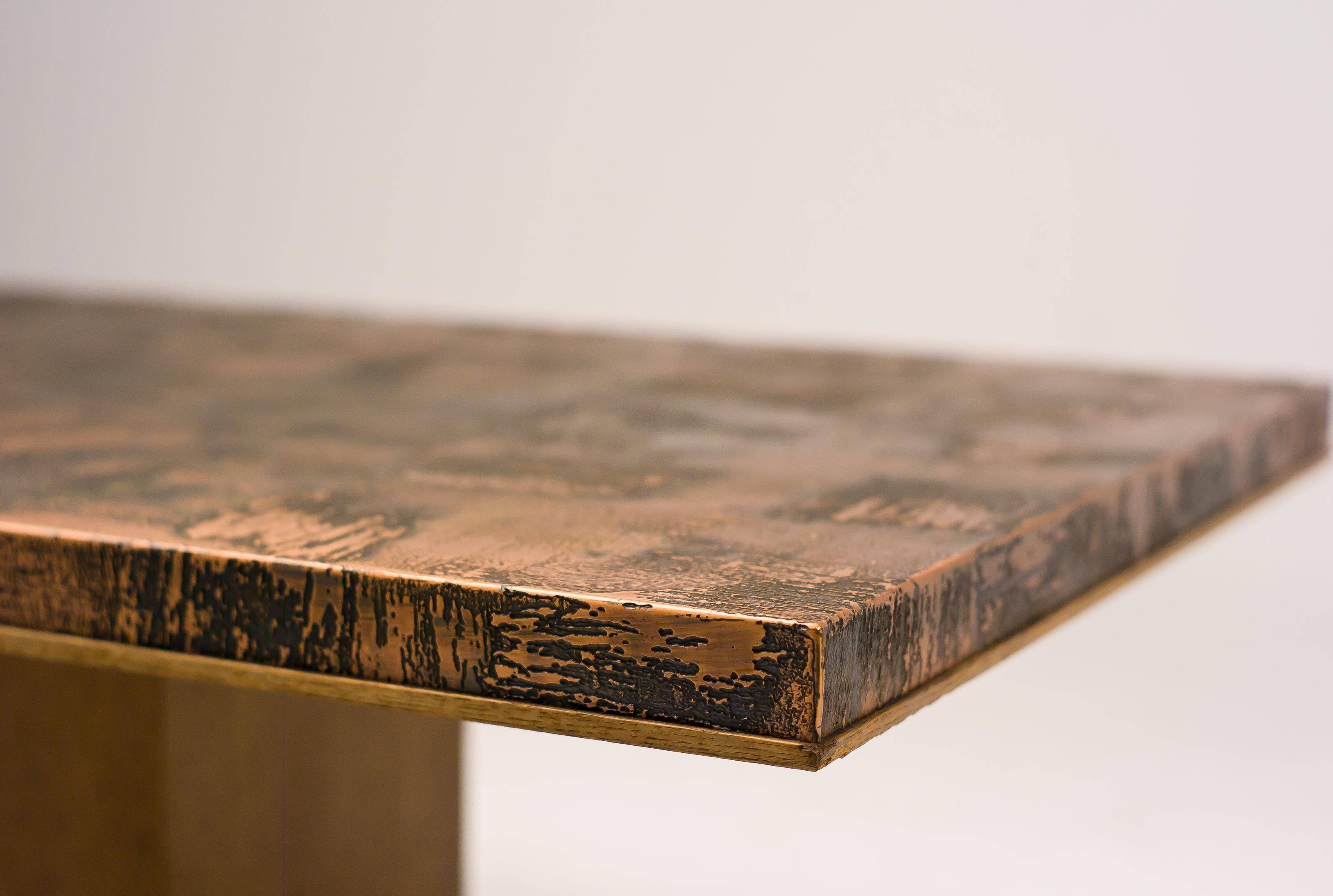 Coffee table with a pressed and engraved brass top by Illum Wikkelsø.