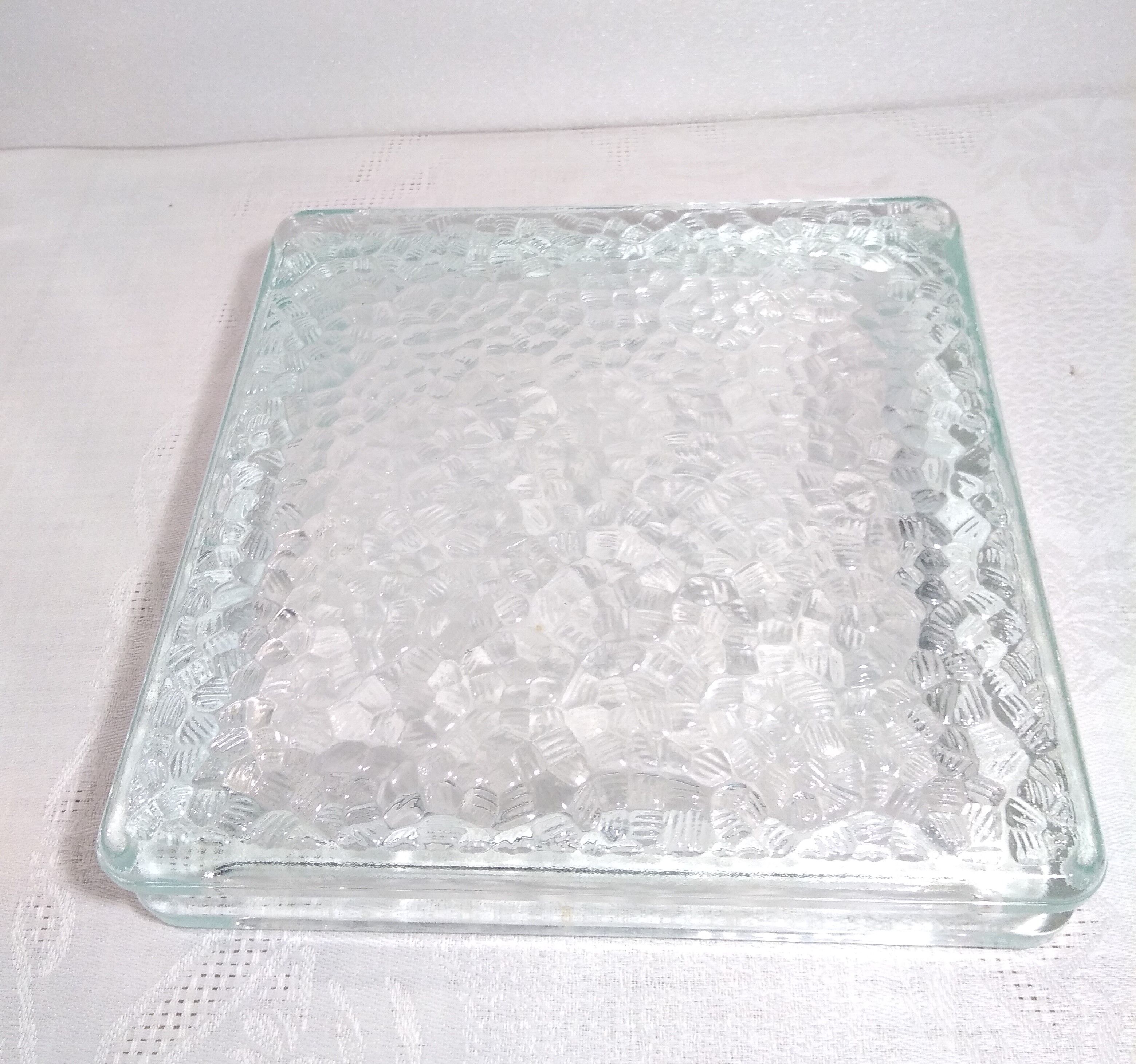 Empty pocket paved with modernist glass