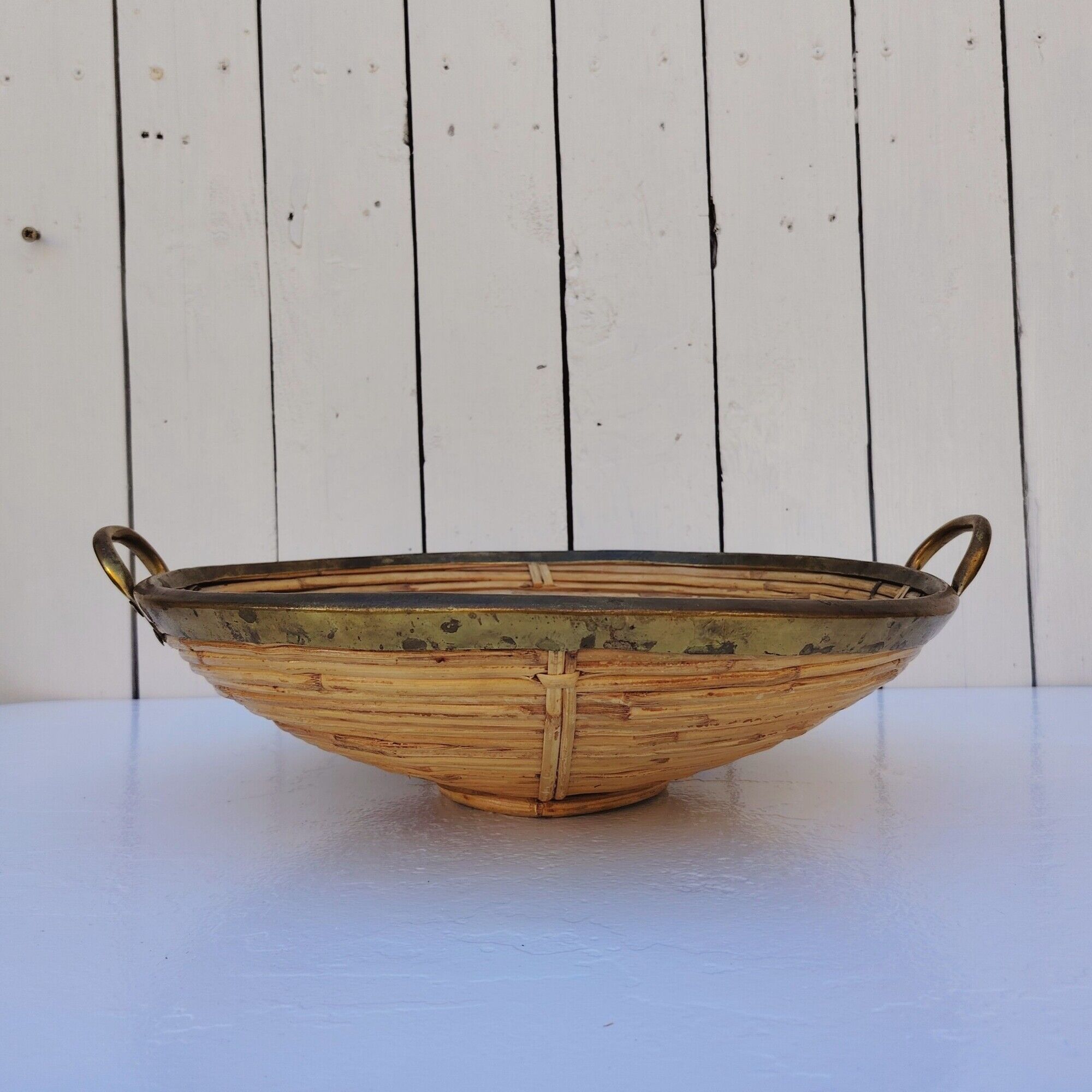 Rattan and brass basket in the style of Gabriella Crespi.