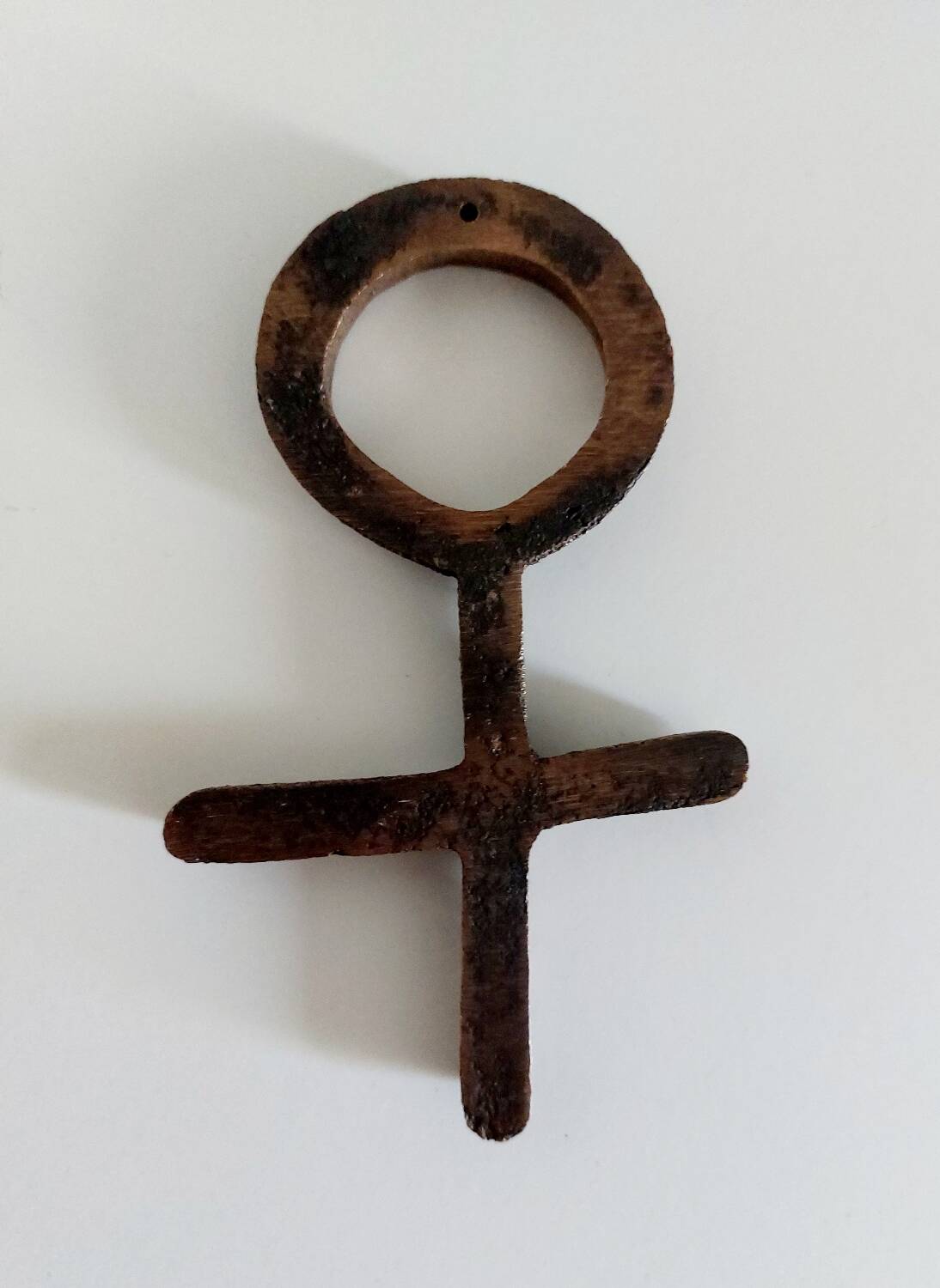 Bronze Venus symbol
