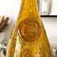 "Bouteille Étroite 45" Biot en verre bullé jaune doré