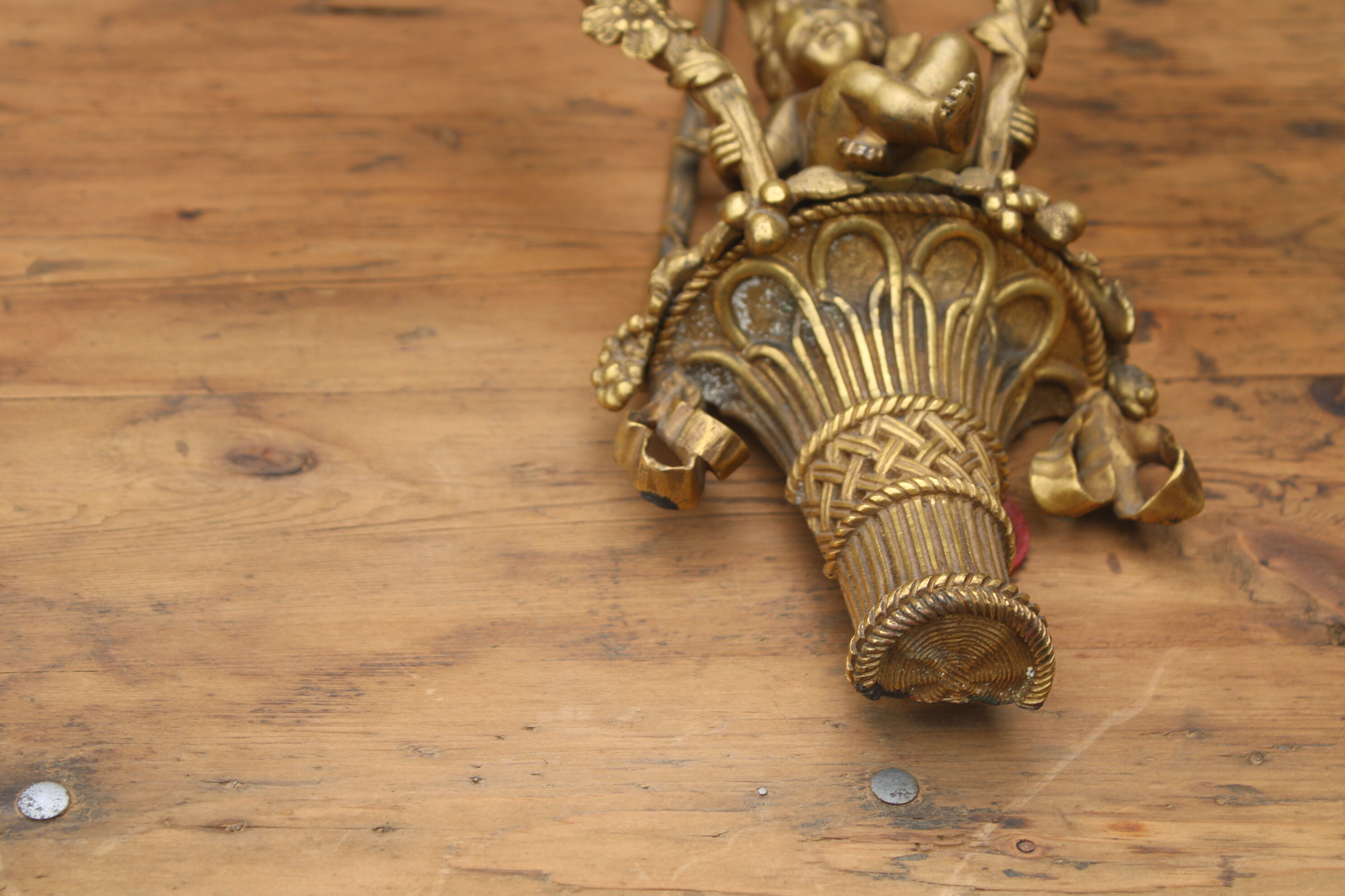 Wall lamp in bronze cherub