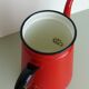 Set milk pot, kettle, coffee maker and red enamelled strainer