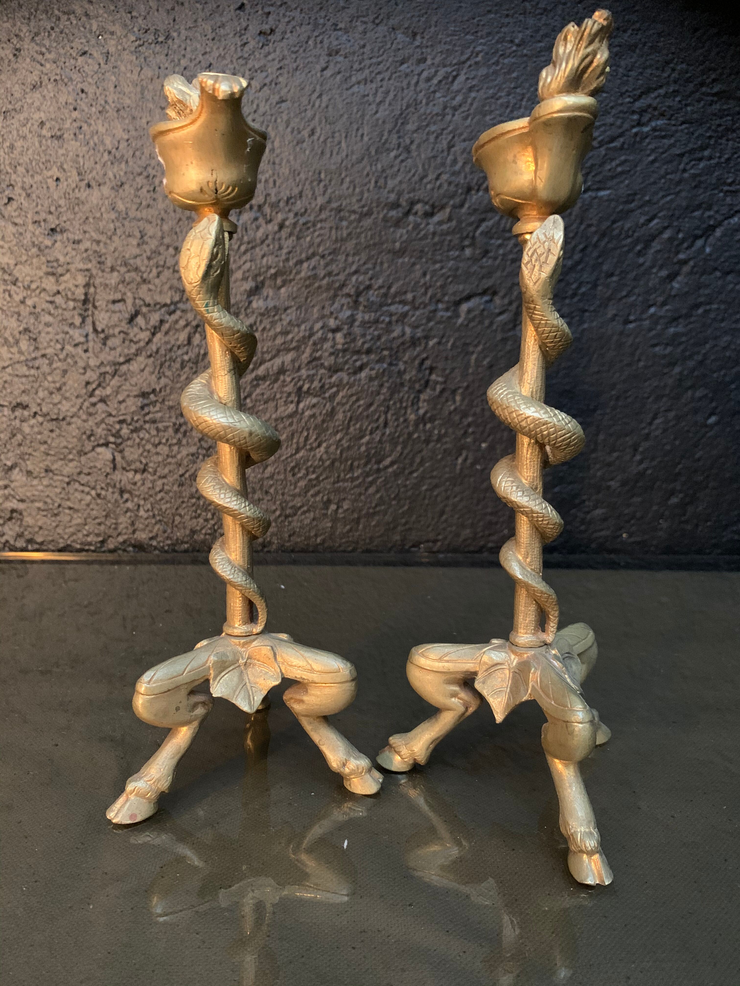 Pair of candlesticks with snakes, gilded bronze 19th century