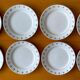 8 antique flat plates in Nimy earthenware