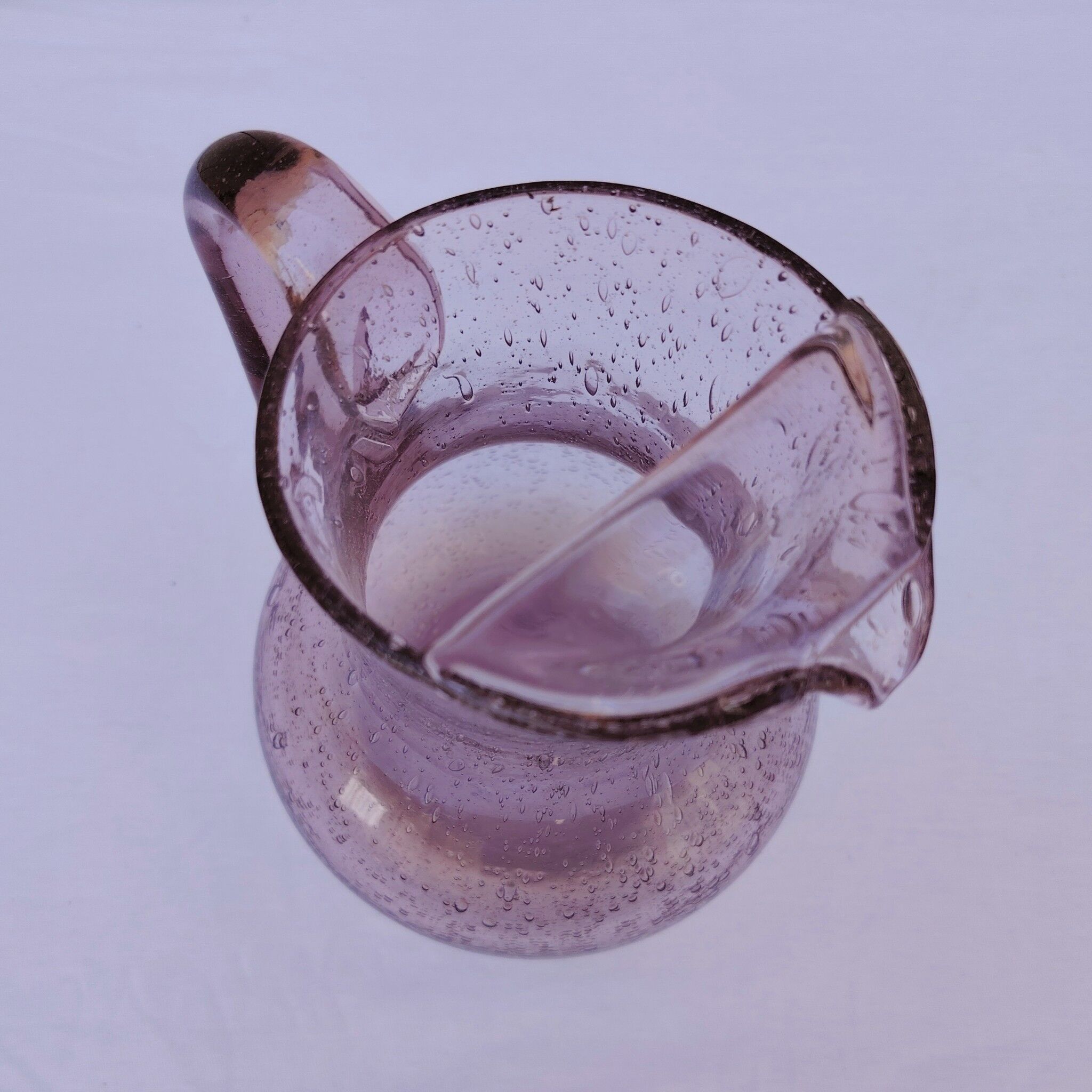 Blown glass pitcher with bubbles, Biot glassware style, vintage.