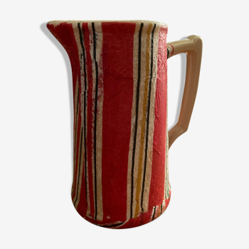 Earthenware pitcher covered with paper