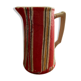 Earthenware pitcher covered with paper