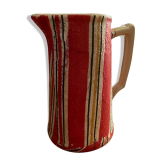 Earthenware pitcher covered with paper