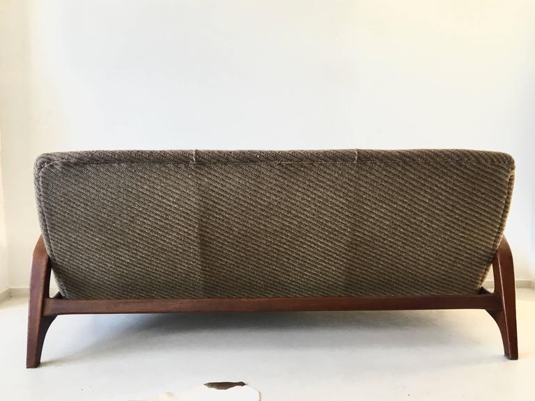 Sofa carved in three places of Gimson and Slater Norway 1960s