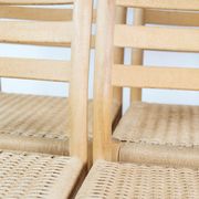 A set of four Kurt Østervig oak dining chairs for K.P. Møbler