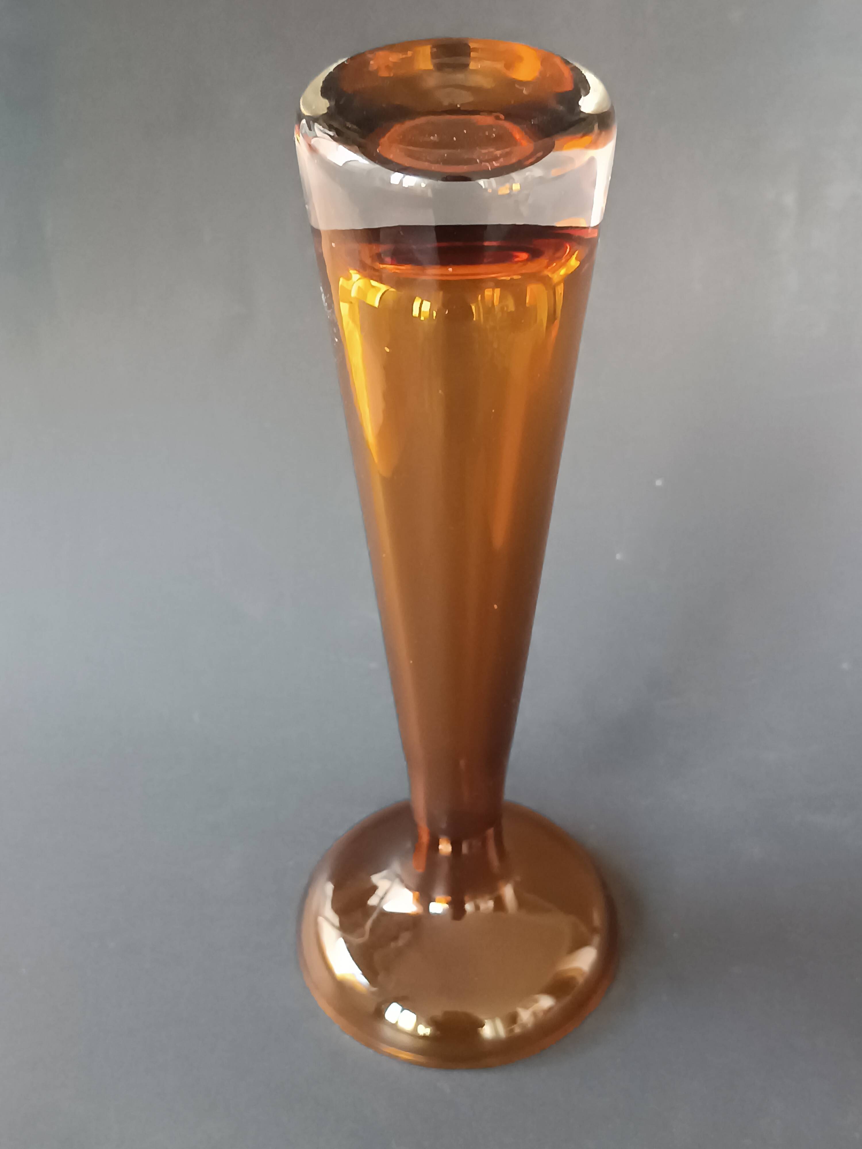 Two vintage Scandinavian double-layered amber blown glass candlesticks
