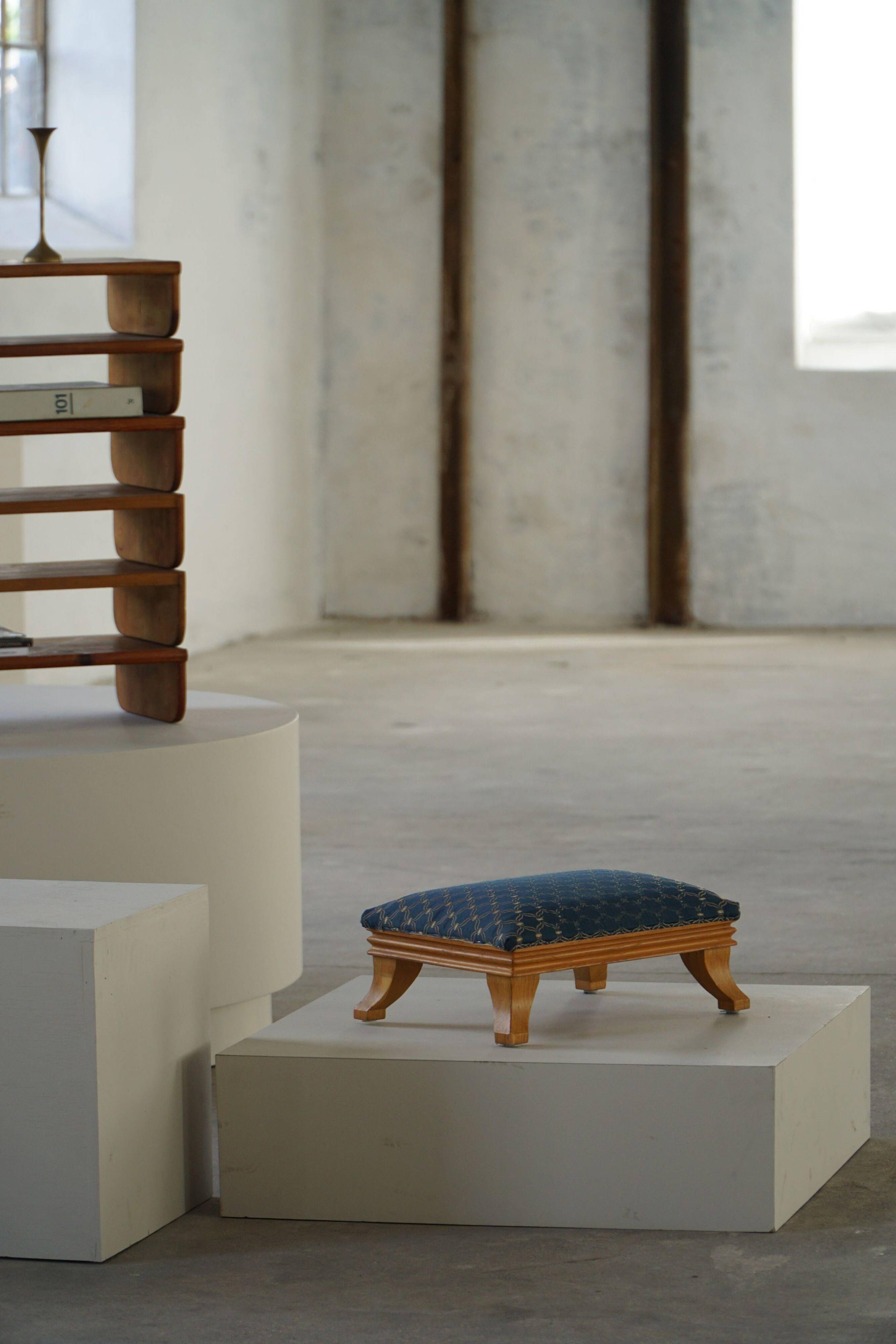 French Art Deco low stool with vintage upholstery made in the 1940s.