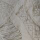 Hand-woven rug in natural wool