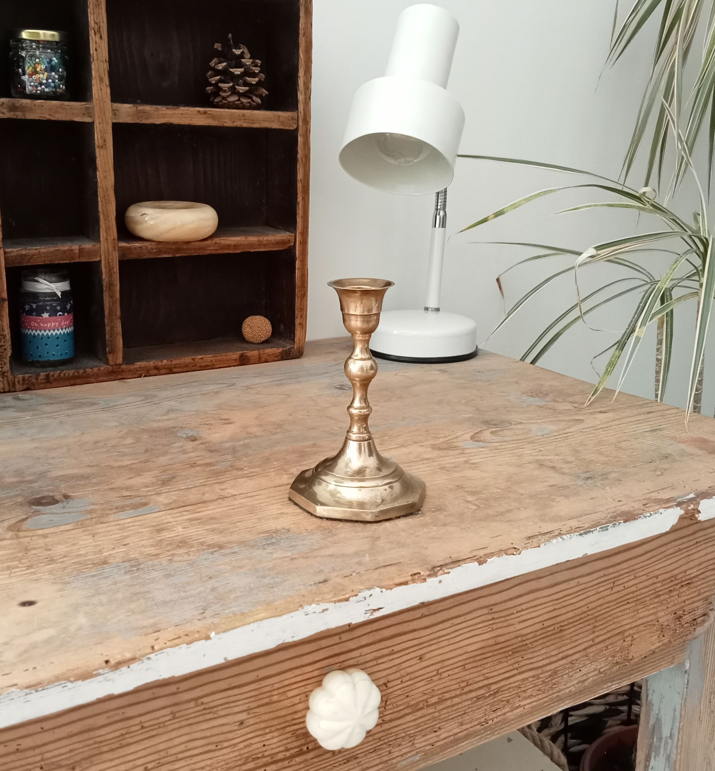 Antique candle holder in solid brass