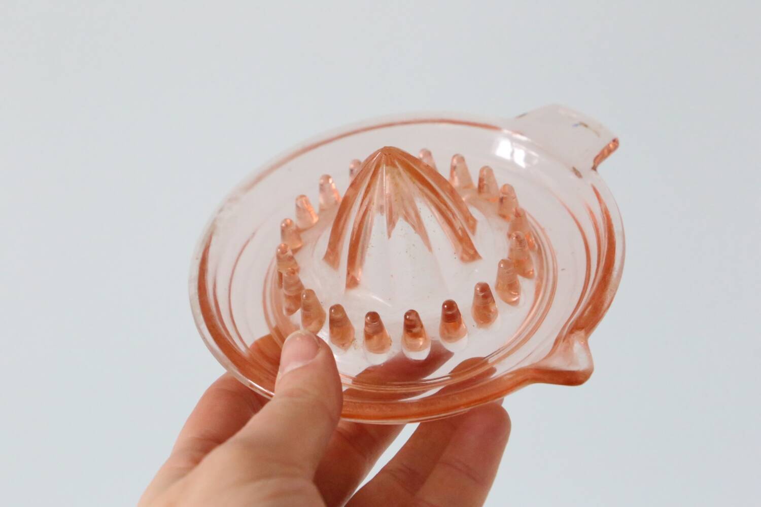 Adorable pink glass juicer