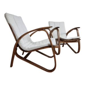 Paire de fauteuils restaurés par