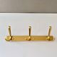 Vintage brass coat rack