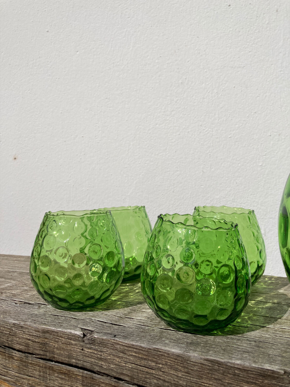 4 green water glasses and vintage blown glass carafe