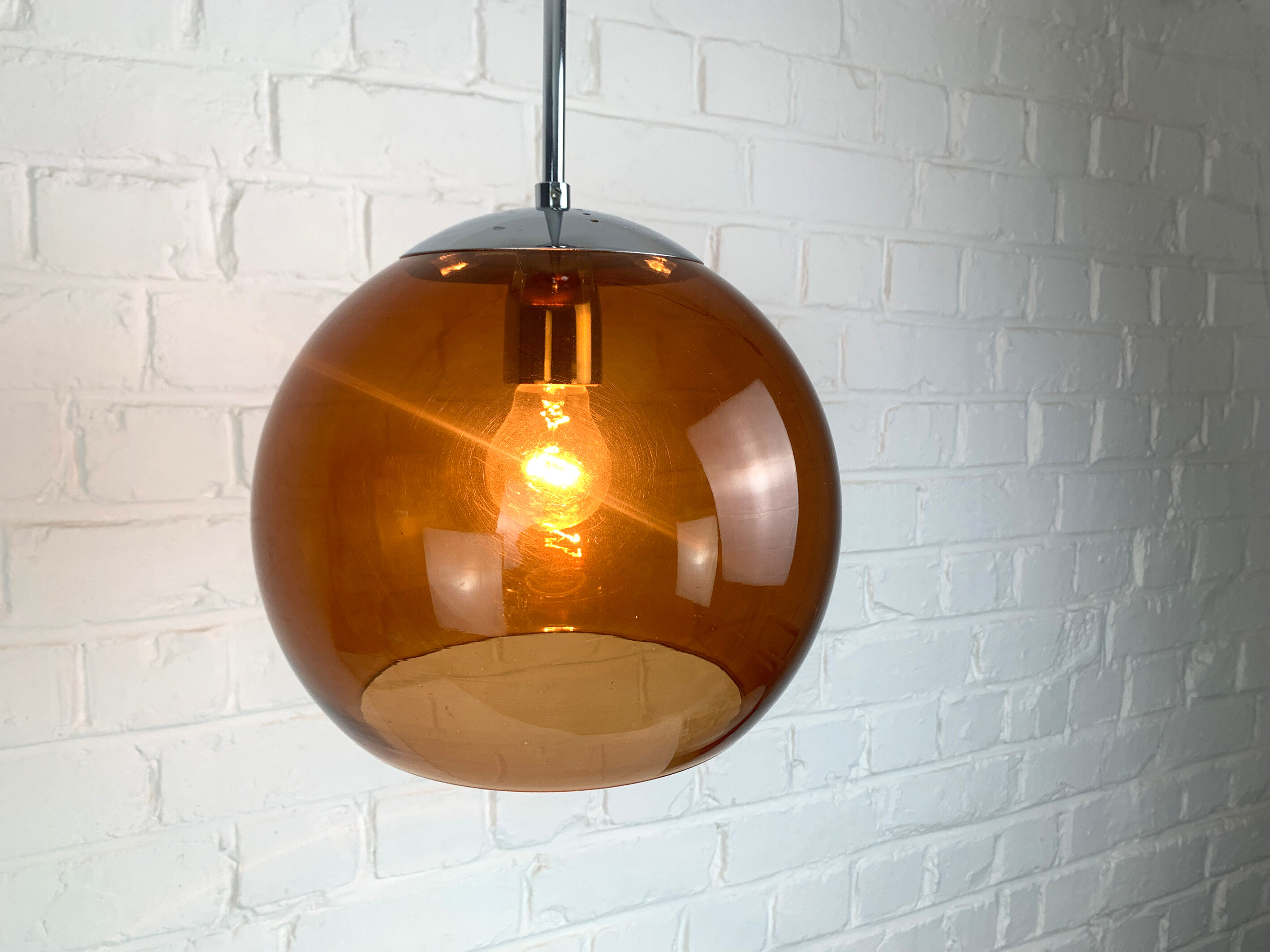 Pendant lamp ball Space Age amber glass chrome 1970s