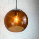 Pendant lamp ball Space Age amber glass chrome 1970s